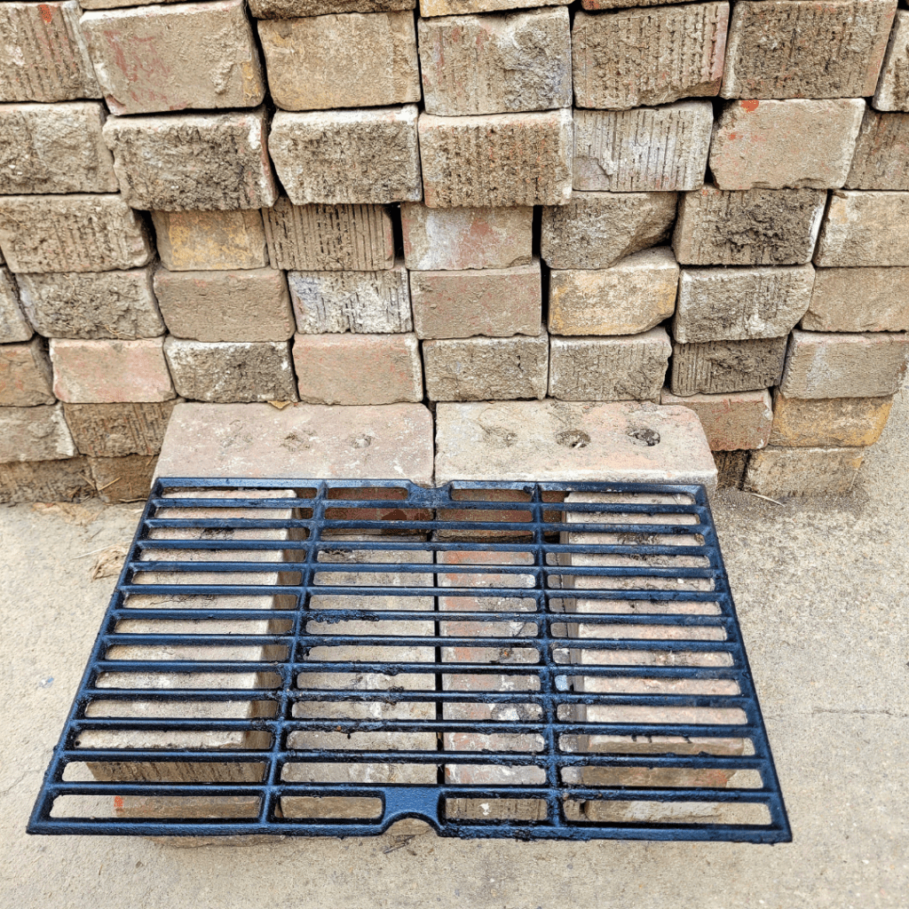 Image illustrates an off-grid rocket stove building tutorial. 