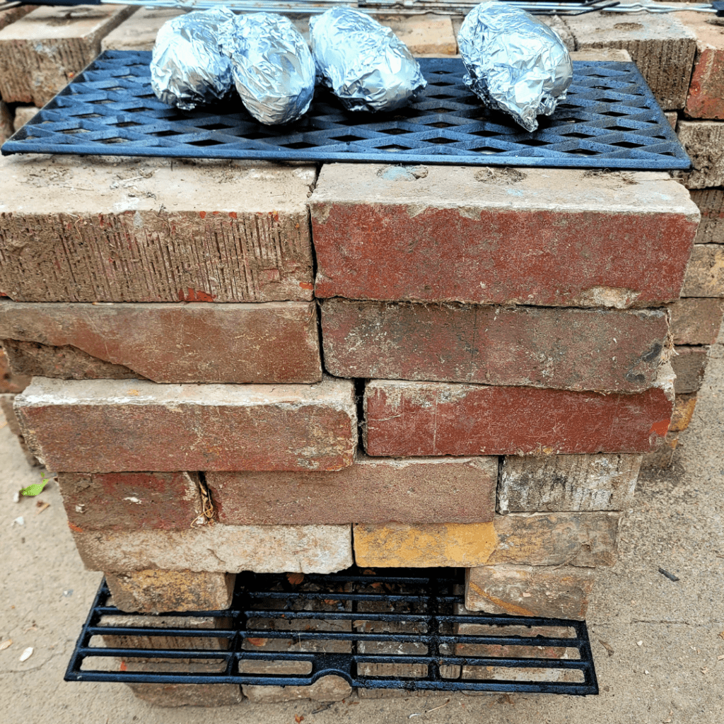 Image illustrates an off-grid rocket stove. 
