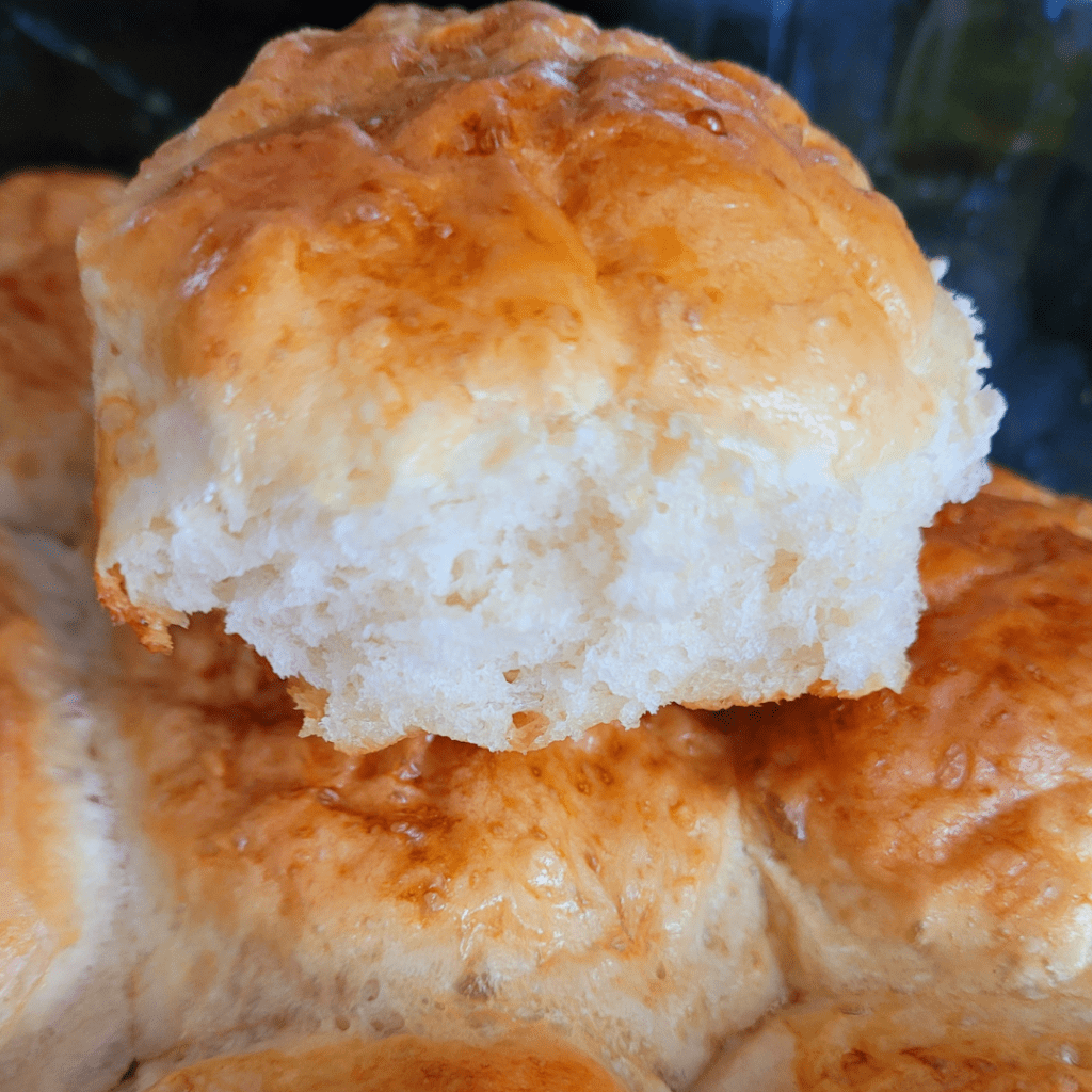 Image illustrates baked rolls for a one hour dinner roll recipe.