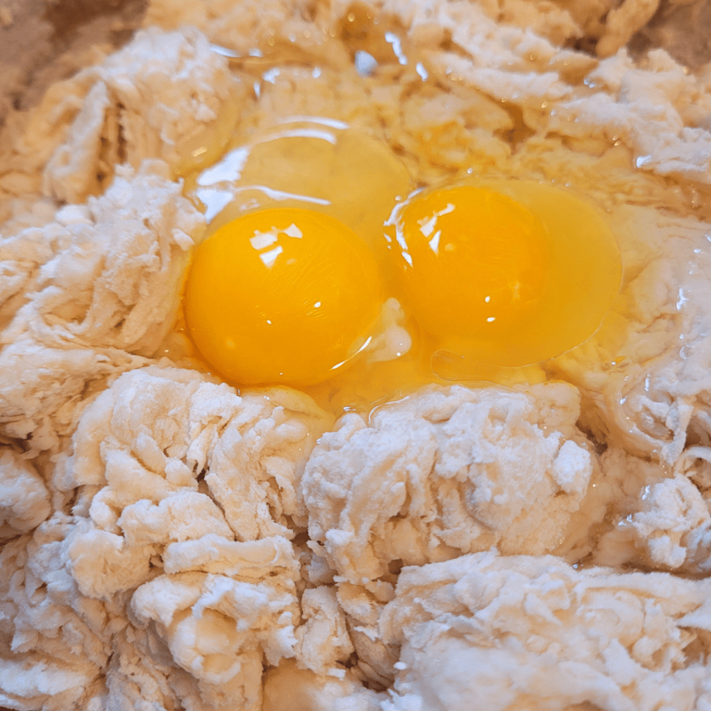Image illustrates shaggy dough with eggs.