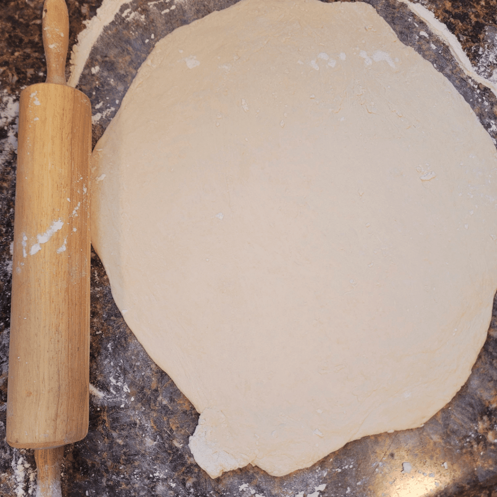 Image illustrates rolled out dough.