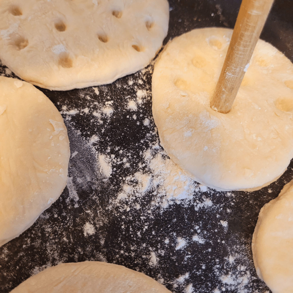 Image illustrates hardtack survival biscuits.