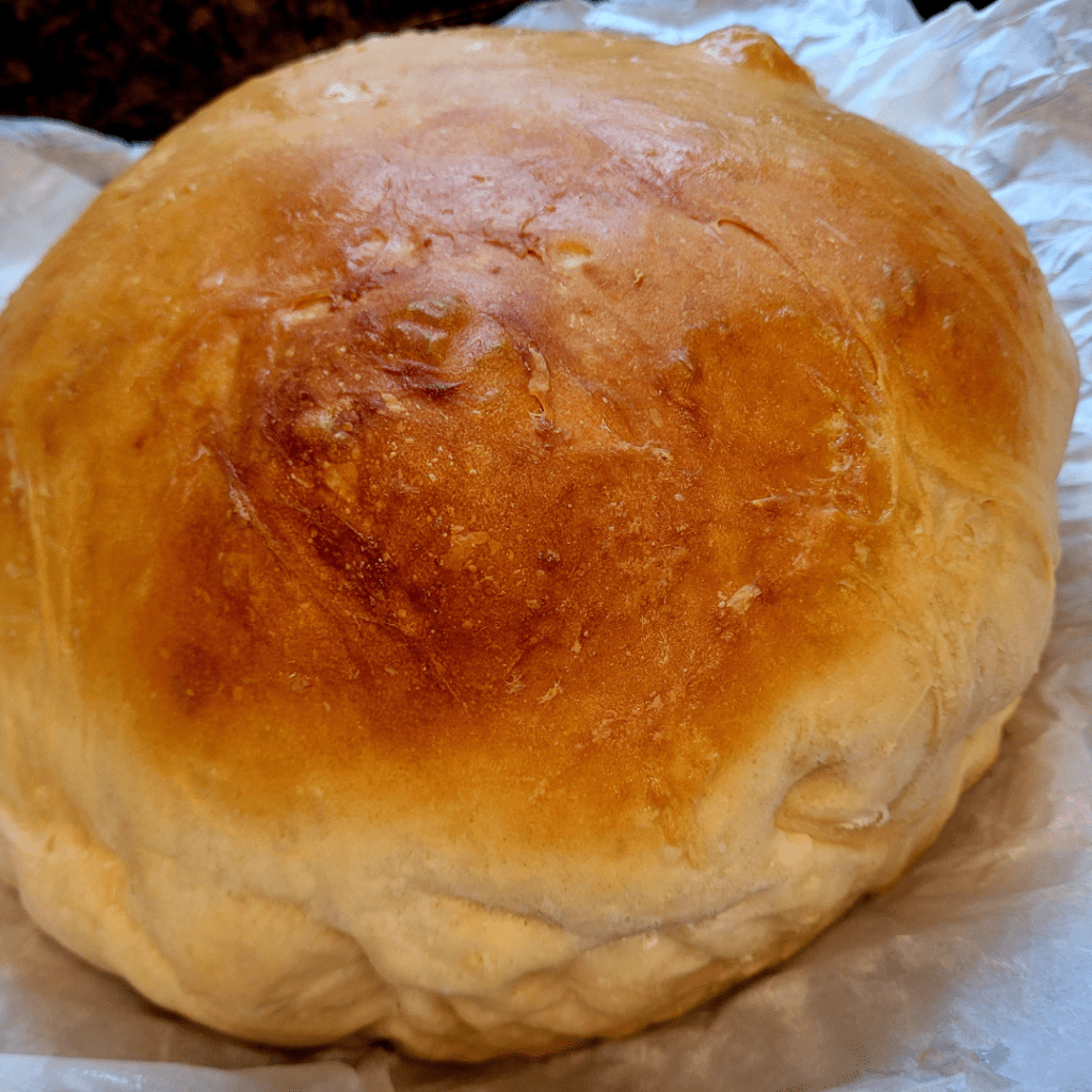 Image illustrates boule bread.