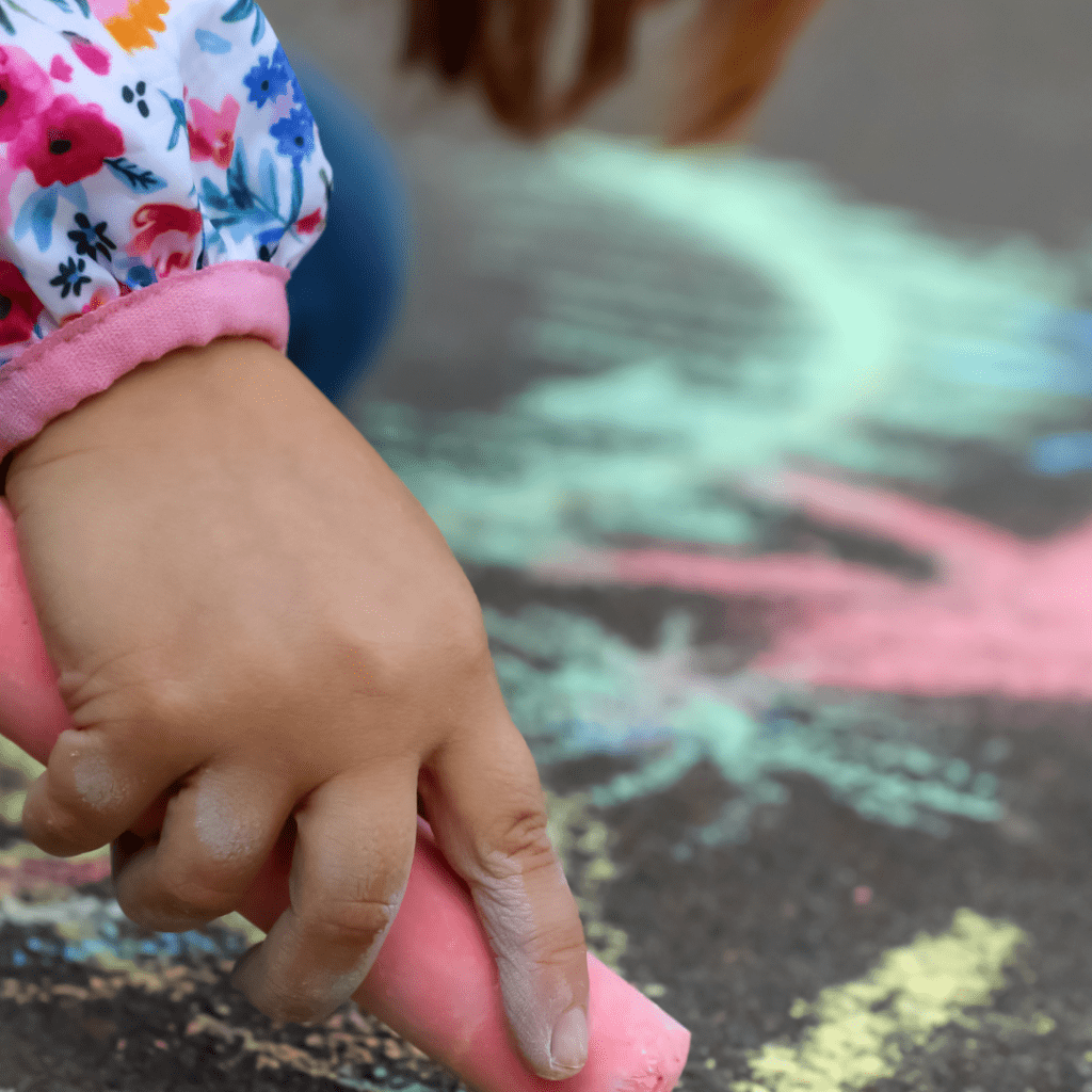Image illustrates free summer boredom busters for kids like sidewalk chalk.