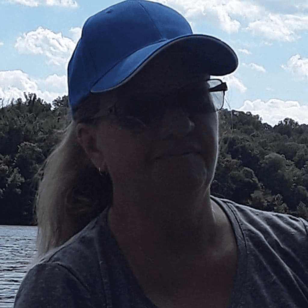 Image illustrates an image of a woman on the lake for lake fishing with kids.