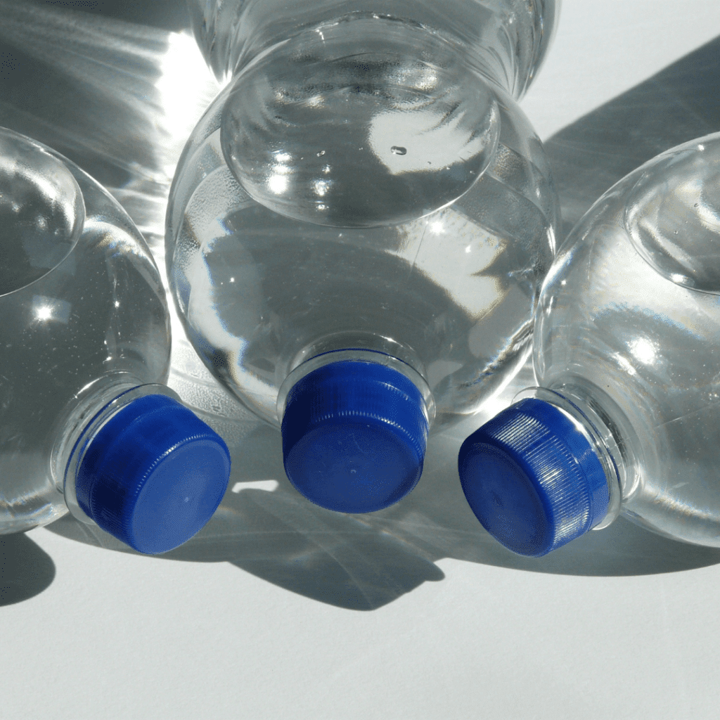 Image illustrates bottled water demonstrating emergency water prep tactics.