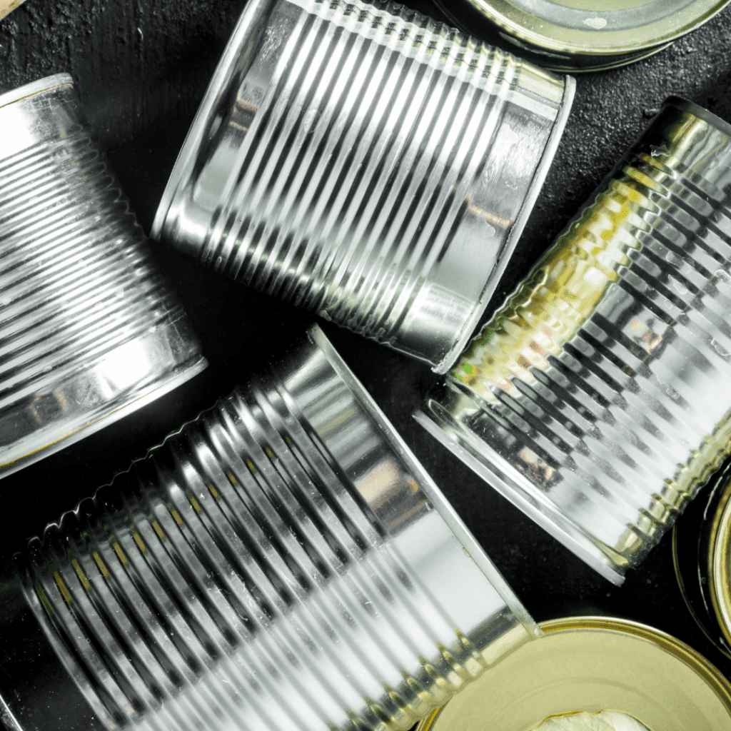 Image illustrates canned food items to be inspected to demonstrate how to open a can of food with your bare hands. 