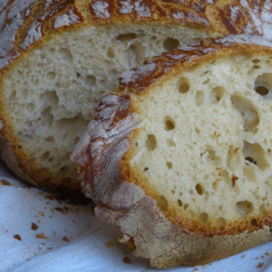 Image illustrates sourdough bread for a sourdough bread recipe tutorial.