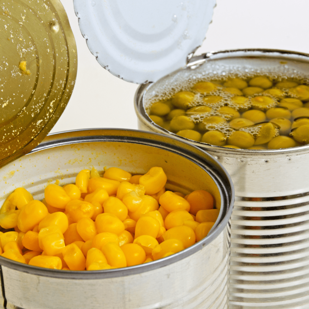 Image illustrating sharp edges of open cans demonstrating how to open a can of food with your bare hands. 