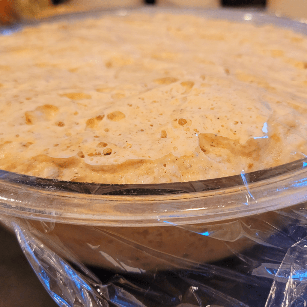 Image illustrates sourdough bulk fermenting.