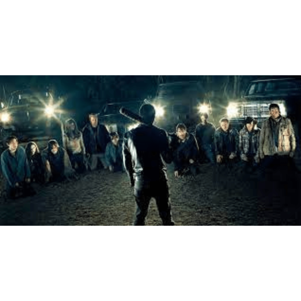 Image illustrates The Walking Dead characters in a group demonstrating overcoming differences and conflict.