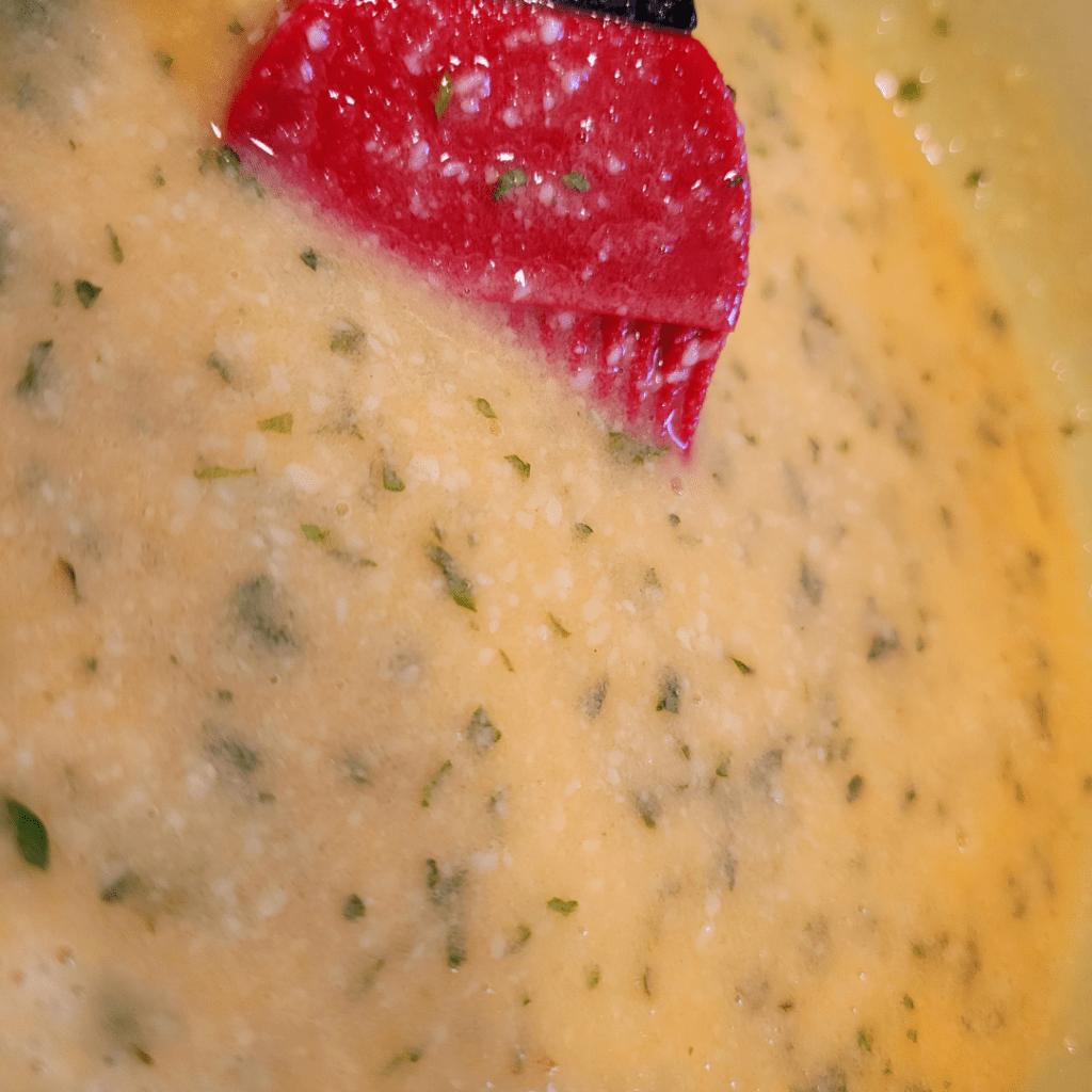 Image illustrates a topping for breadsticks.