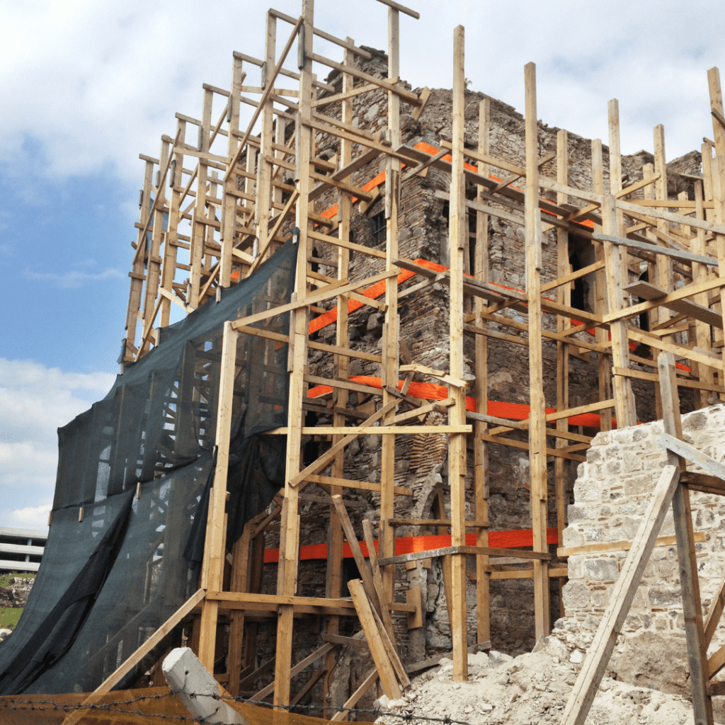 Image illustrates rebuilding after a warzone demonstrating how to survive a war as a civilian.