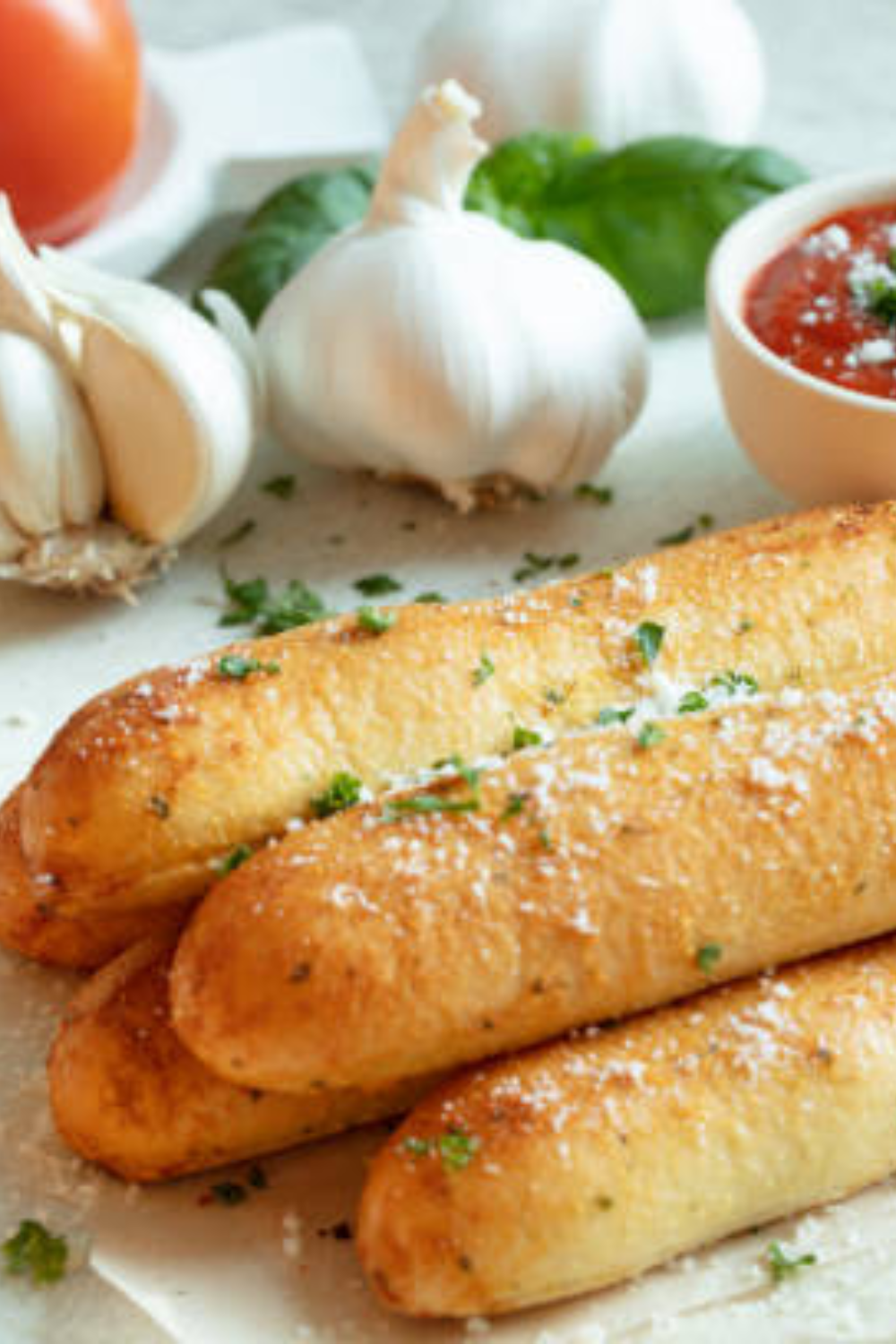 Image illustrates sourdough bread sticks.