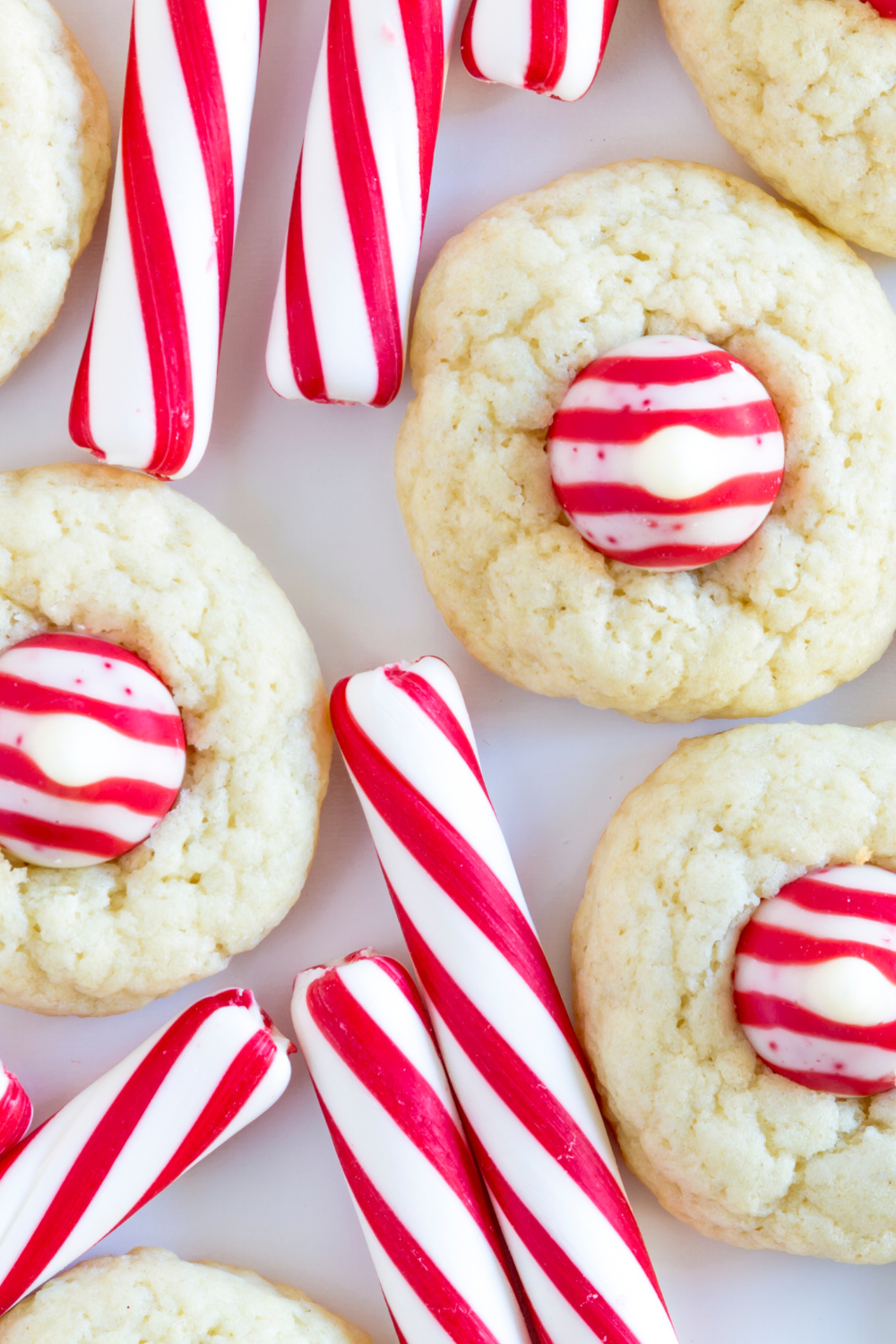 Image illustrates candy cane kiss cookies.