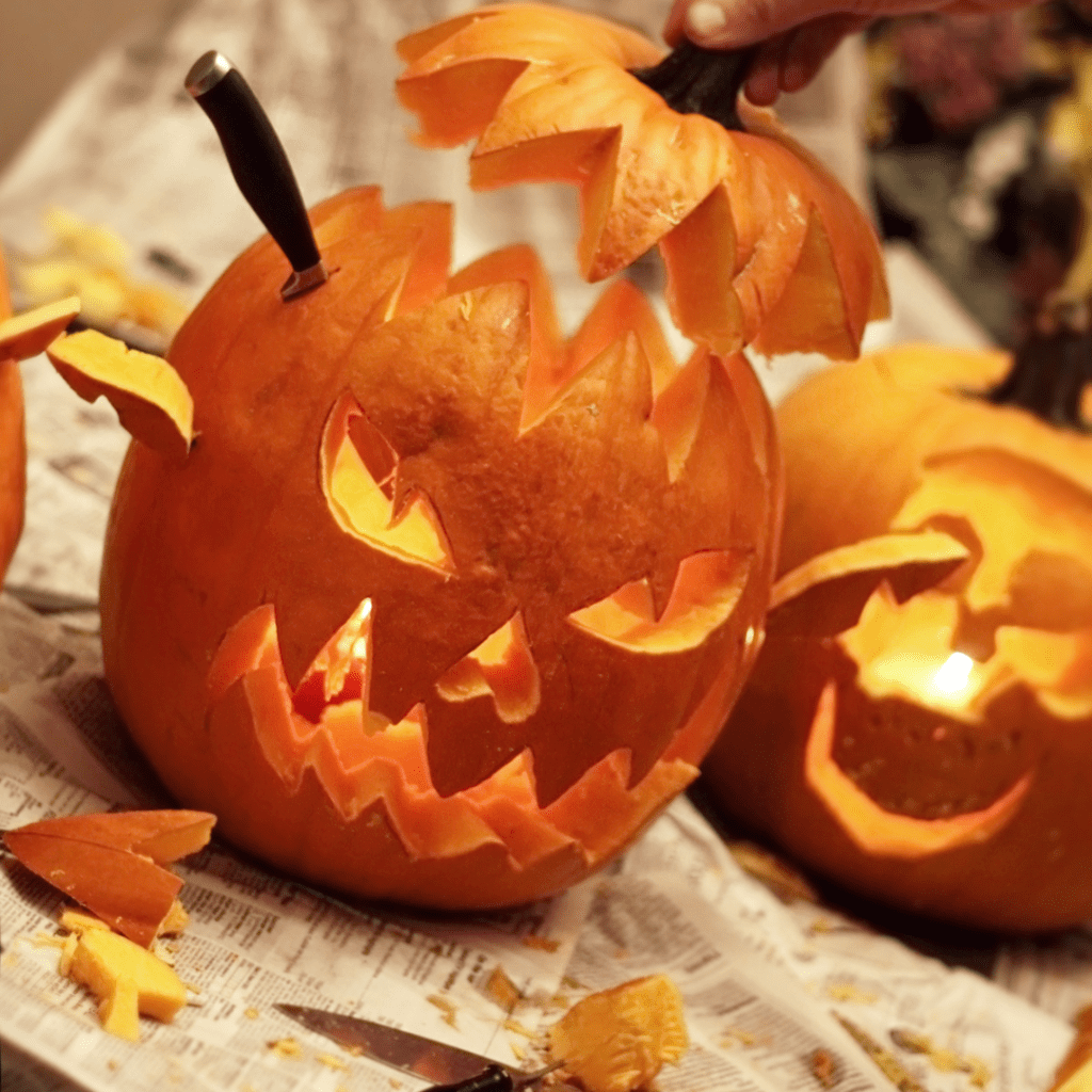 Image illustrates a carved pumpkin. 