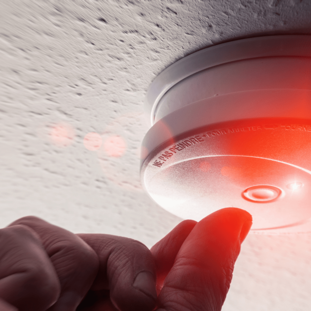 Image illustrates a smoke alarm. 