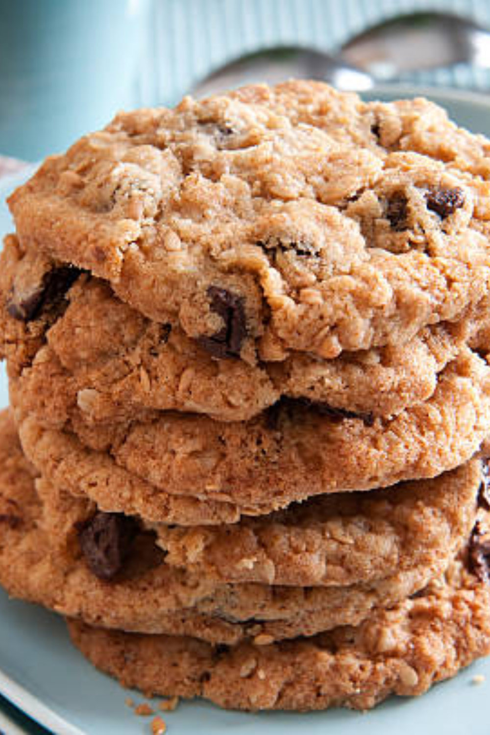 Image illustrates classic oatmeal chocolate chip cookies. 