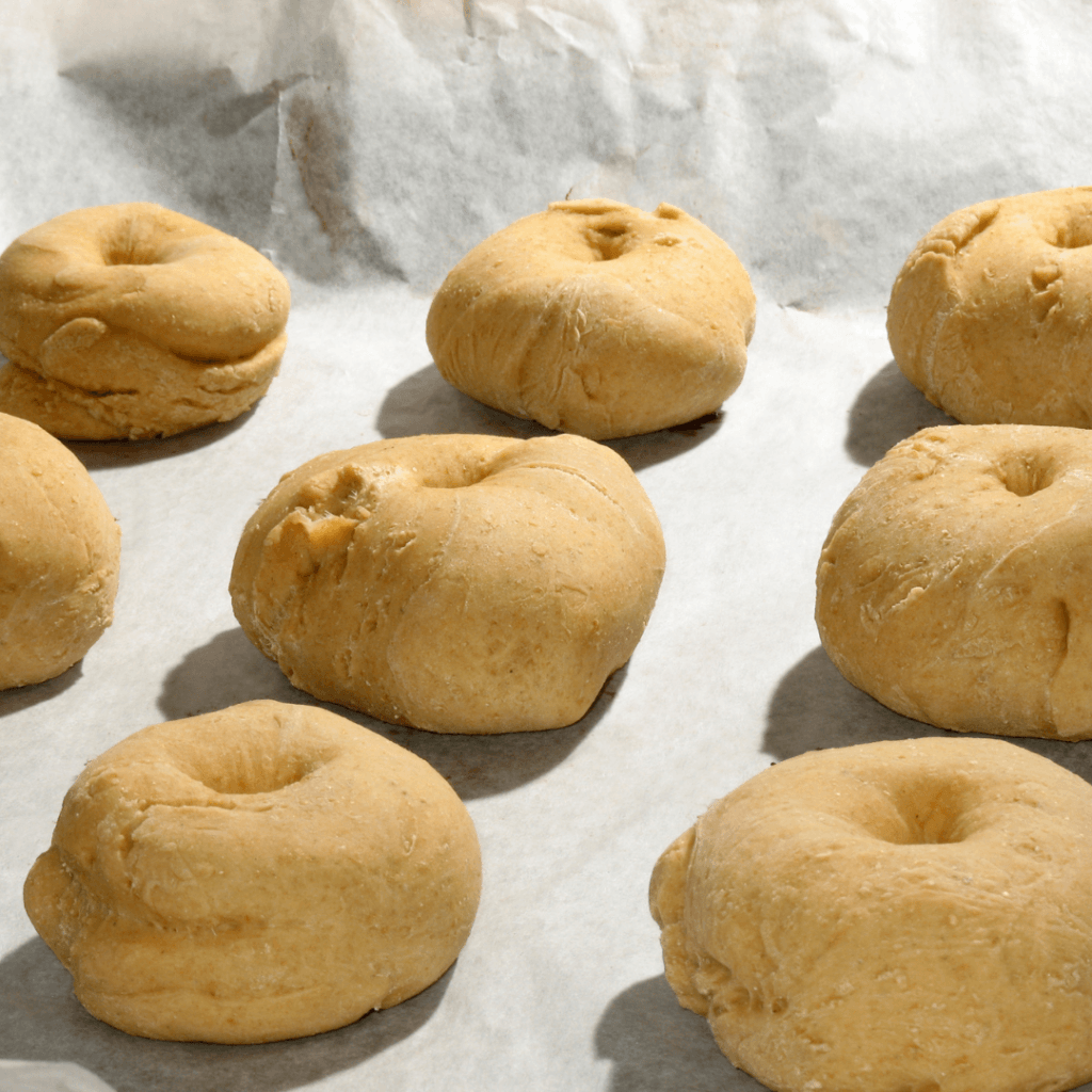 Image illustrates homemade bagels. 