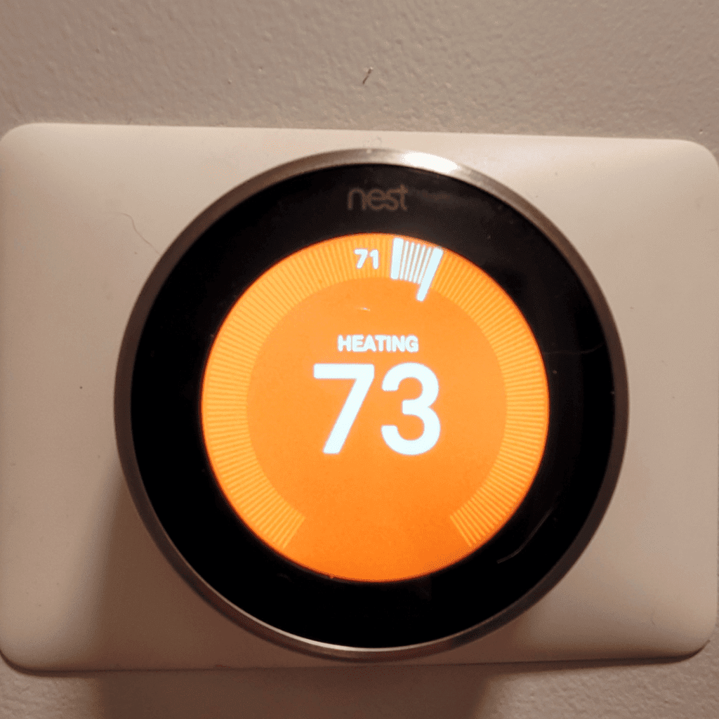 Image illustrates a thermostat.
