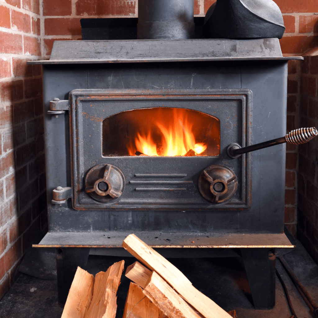 Image illustrates a wood burning stove demonstrating information on how to winterize your home. 