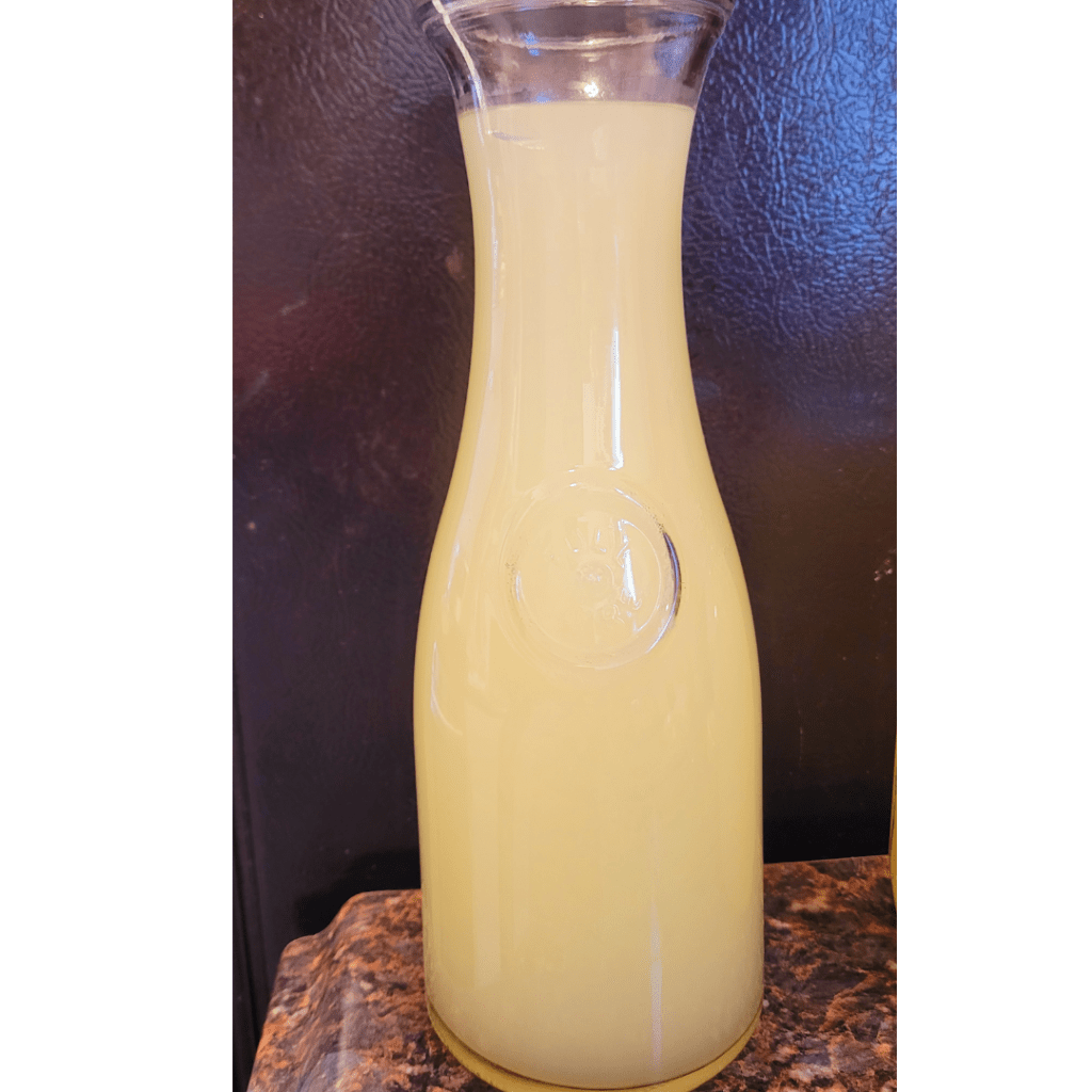 Image illustrates whey in a bottle demonstrating uses for whey.