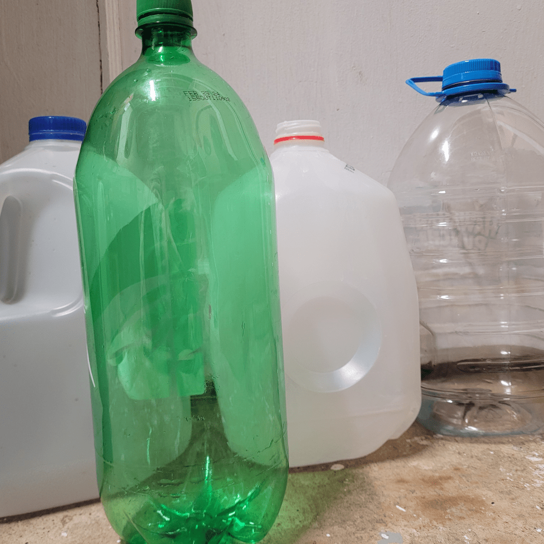Image illustrates clear recycled jugs and bottles for winter sowing containers.