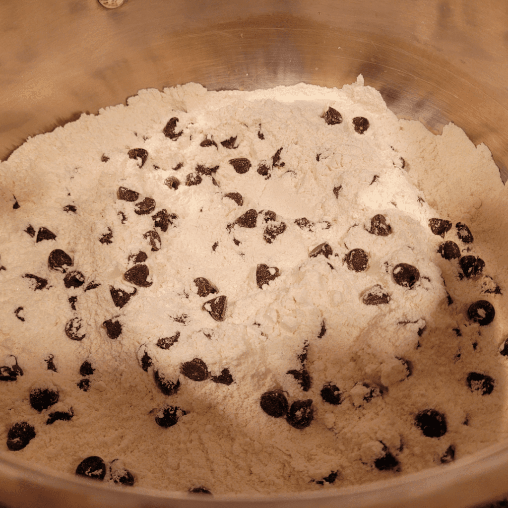 Image illustrates a mixture for sourdough discard scones. 