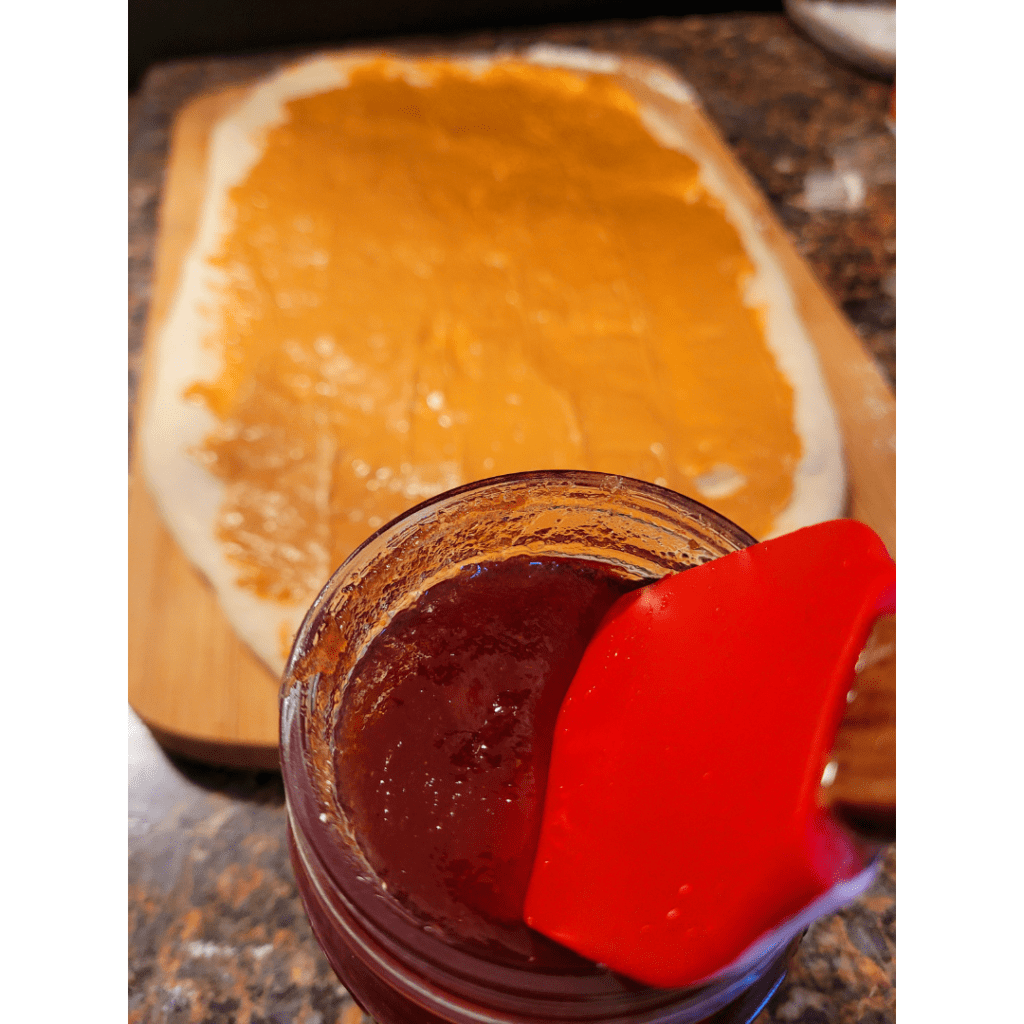 Image illustrates peanut butter and jelly rolls recipe.