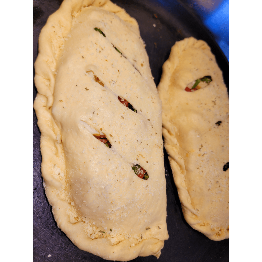 Image illustrates sourdough calzones.