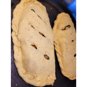 Image illustrates sourdough calzones.