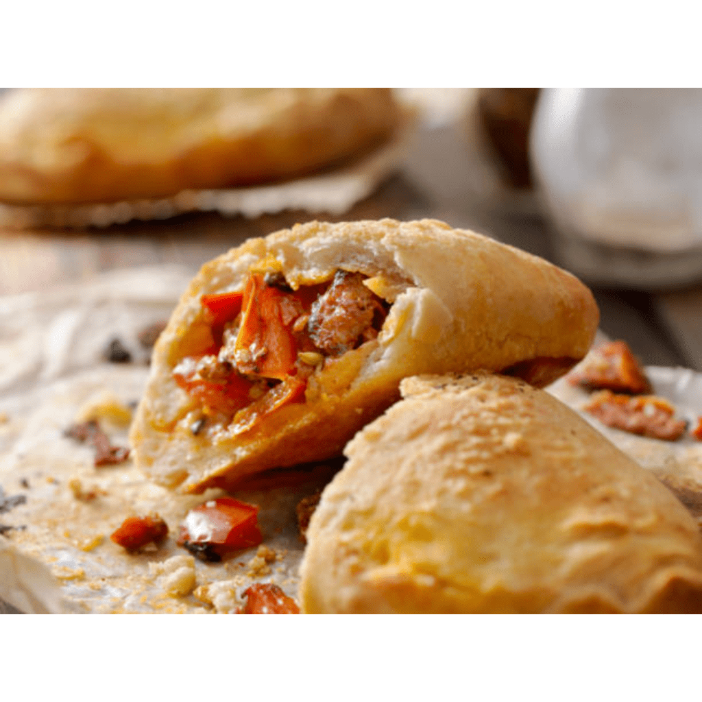 Image illustrates calzones. 