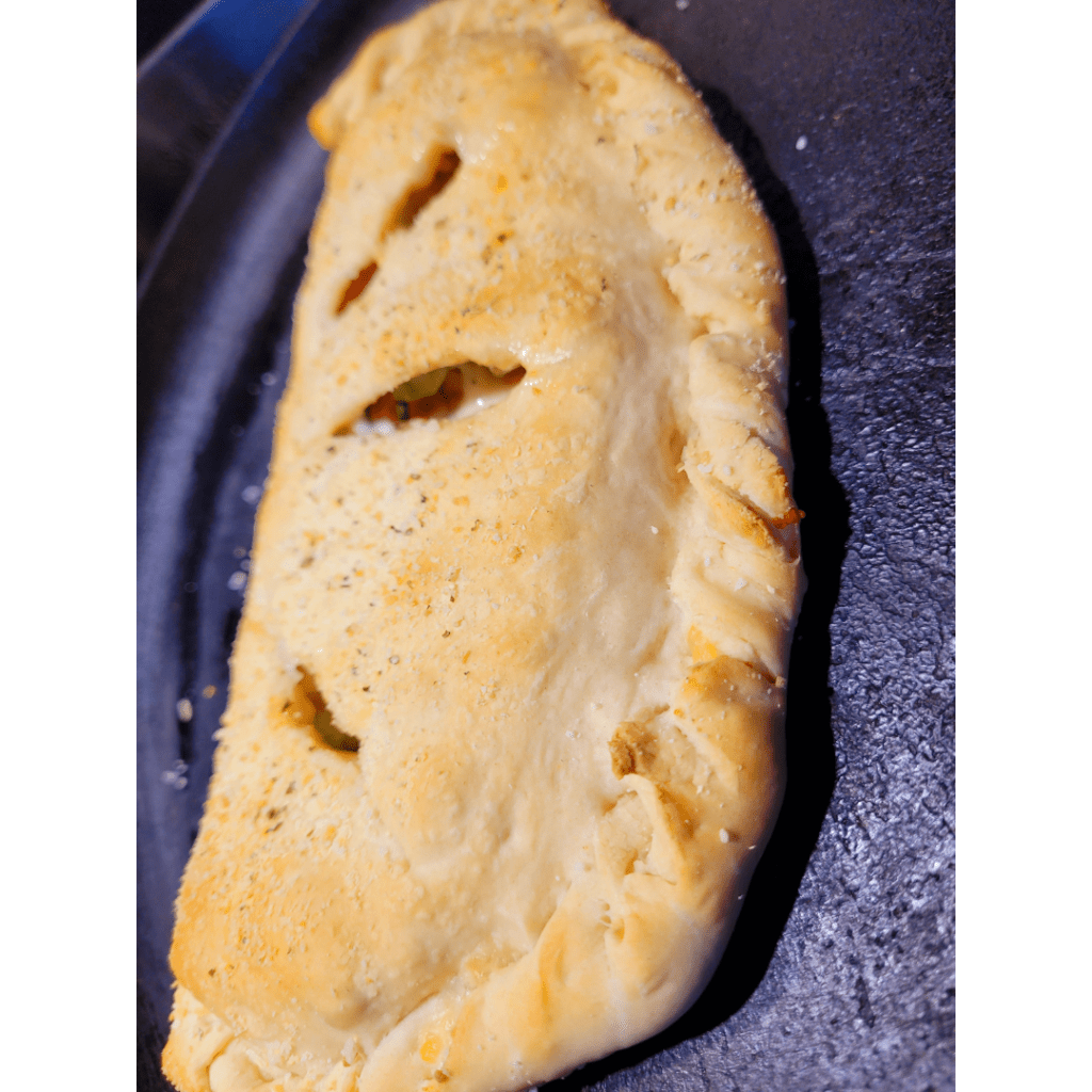 Image illustrates sourdough calzones. 