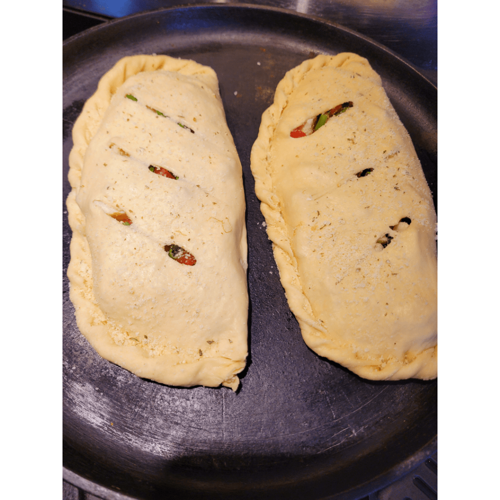 Image illustrates sourdough calzones. 