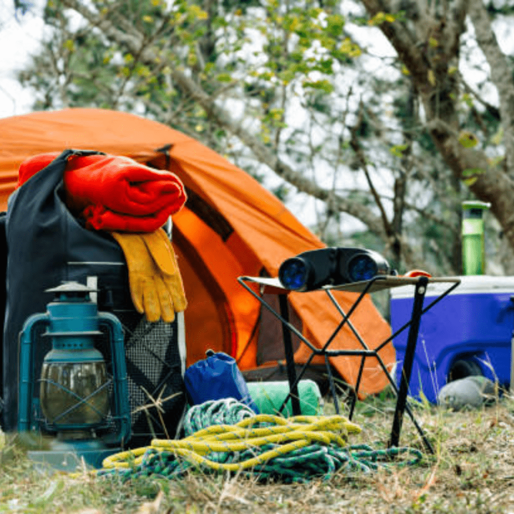Image illustrates a tent with equipment for camping gear. 