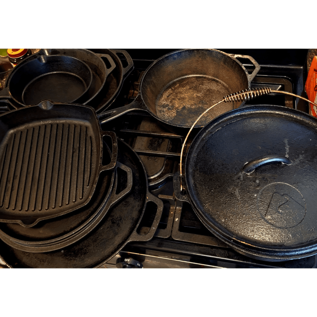 Image illustrates a collection of cast iron cookware. 