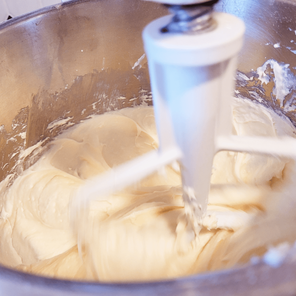 Image illustrates cream cheese lemon frosting. 