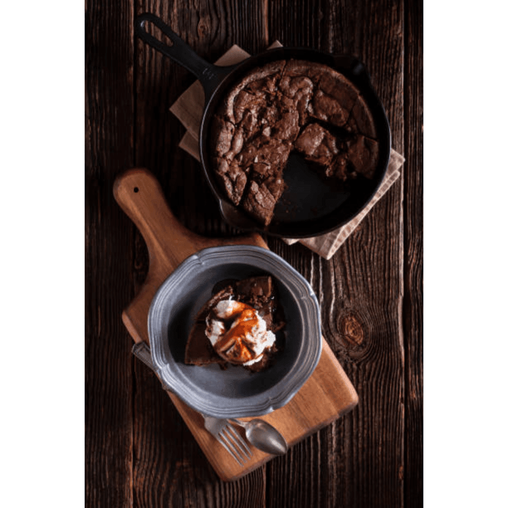 Image illustrates cast iron skillet dessert.