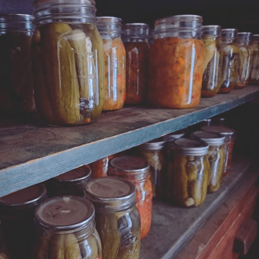 Image illustrates canning shelves for canning supplies.