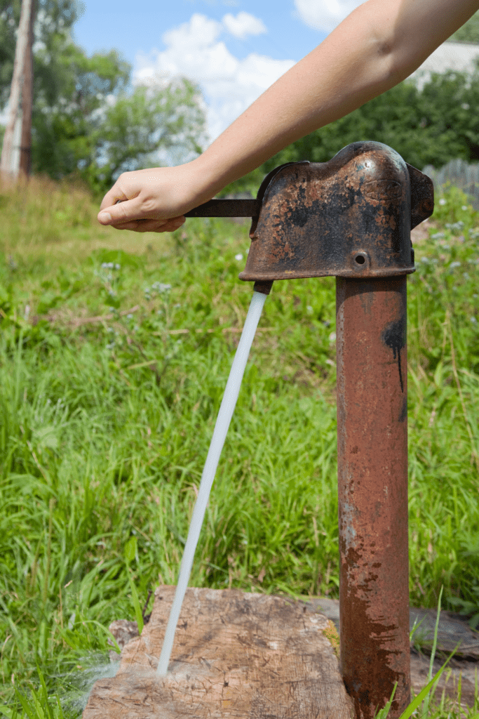 Image illustrates a water well for how to live off-grid. 