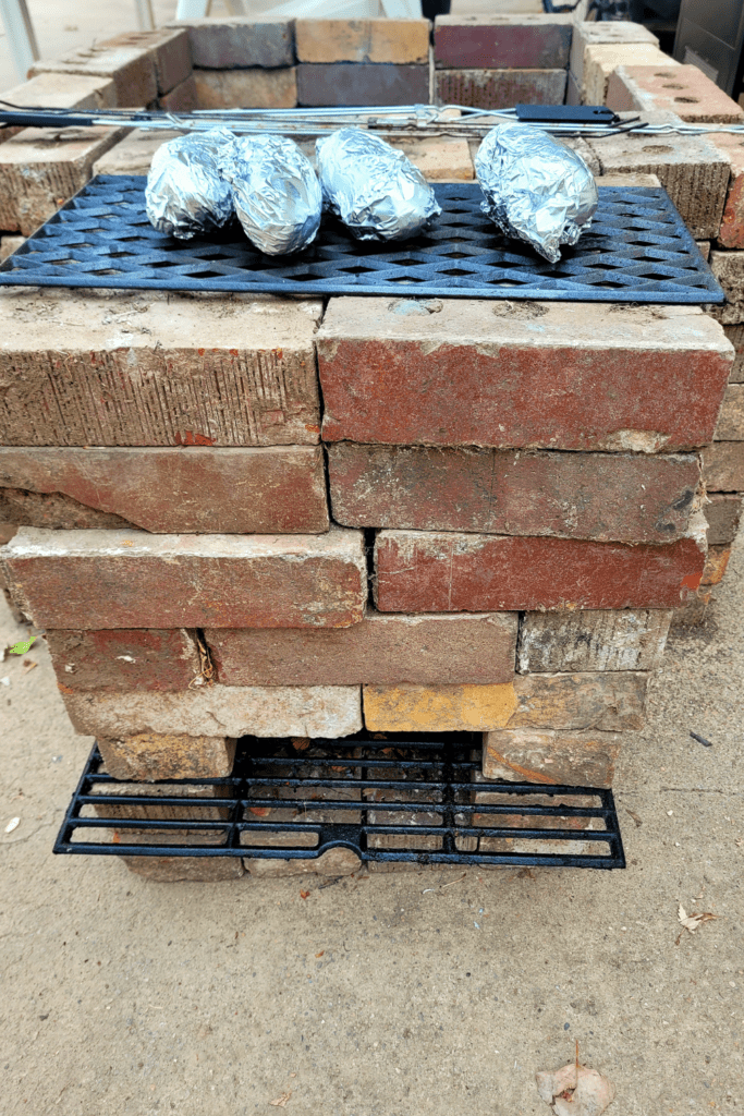 Image illustrates an off grid rocket stove. 