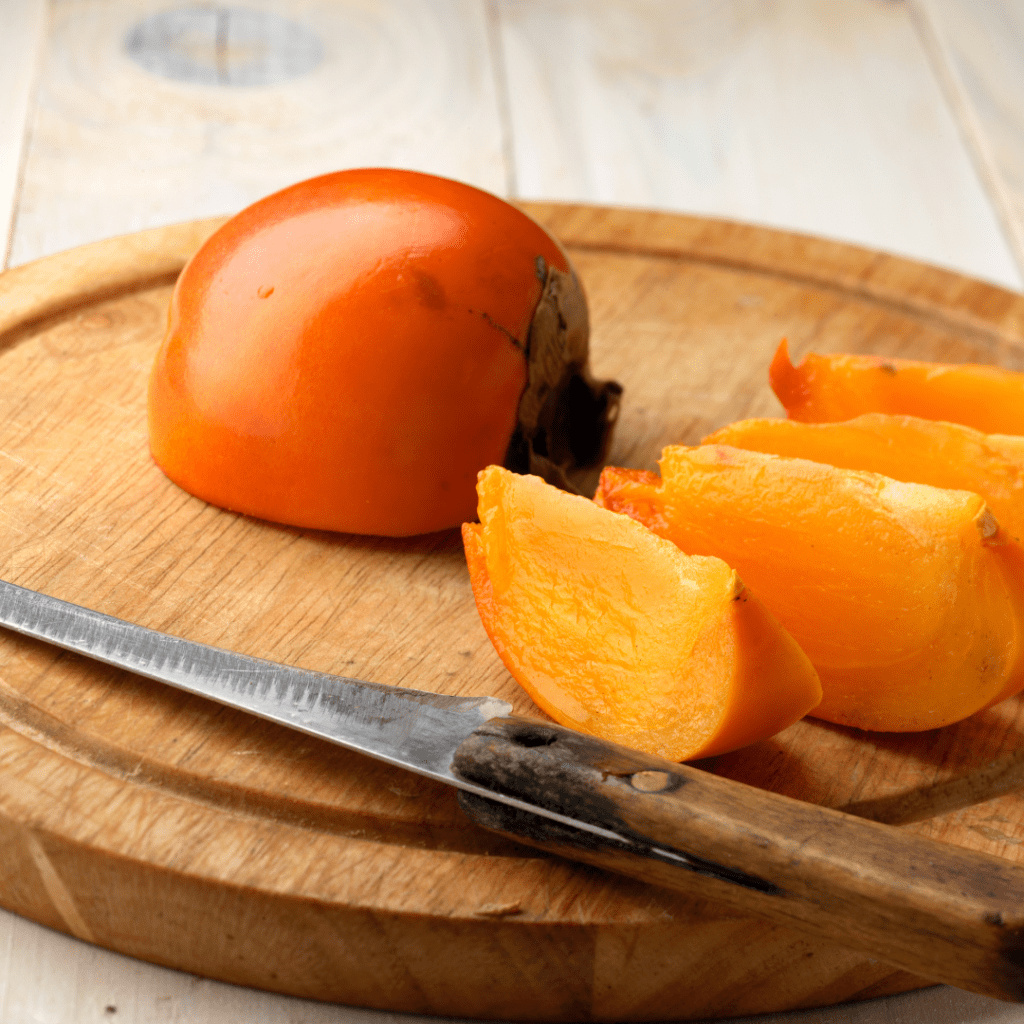 Image illustrates persimmons. 