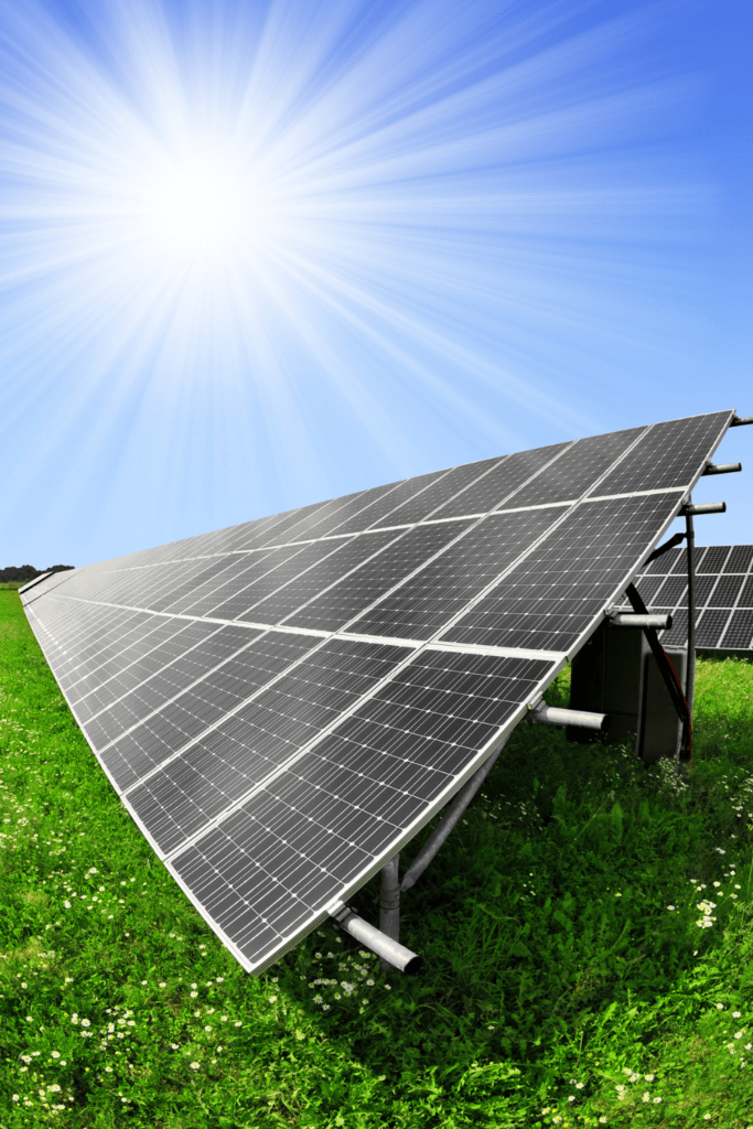 Image illustrates solar panels for how to live off-grid. 