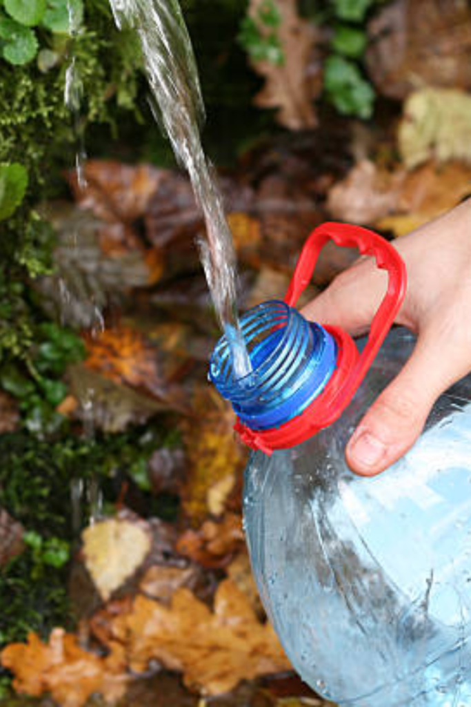Image illustrates collecting and purifying water for SHTF planning. 