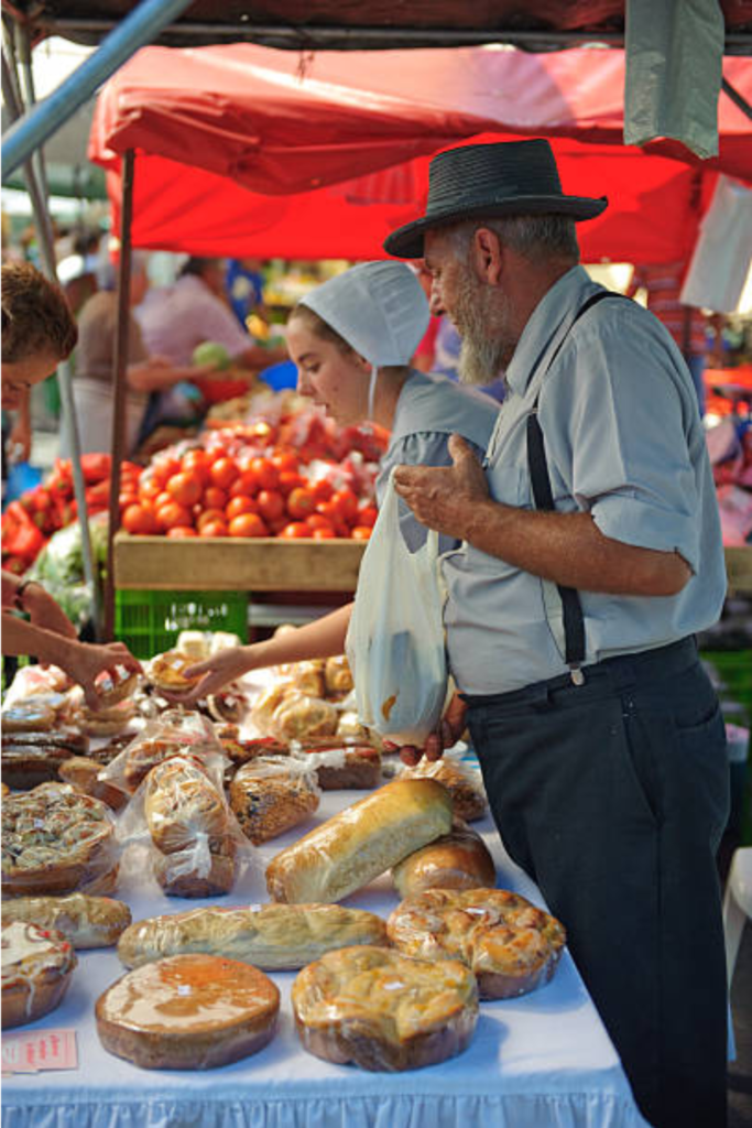 Image illustrates an Amish man at an Amish market.