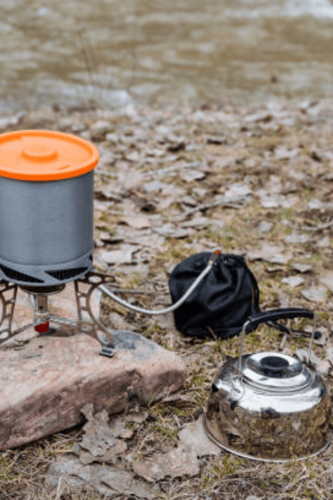 Image illustrates camping cooking equipment. 