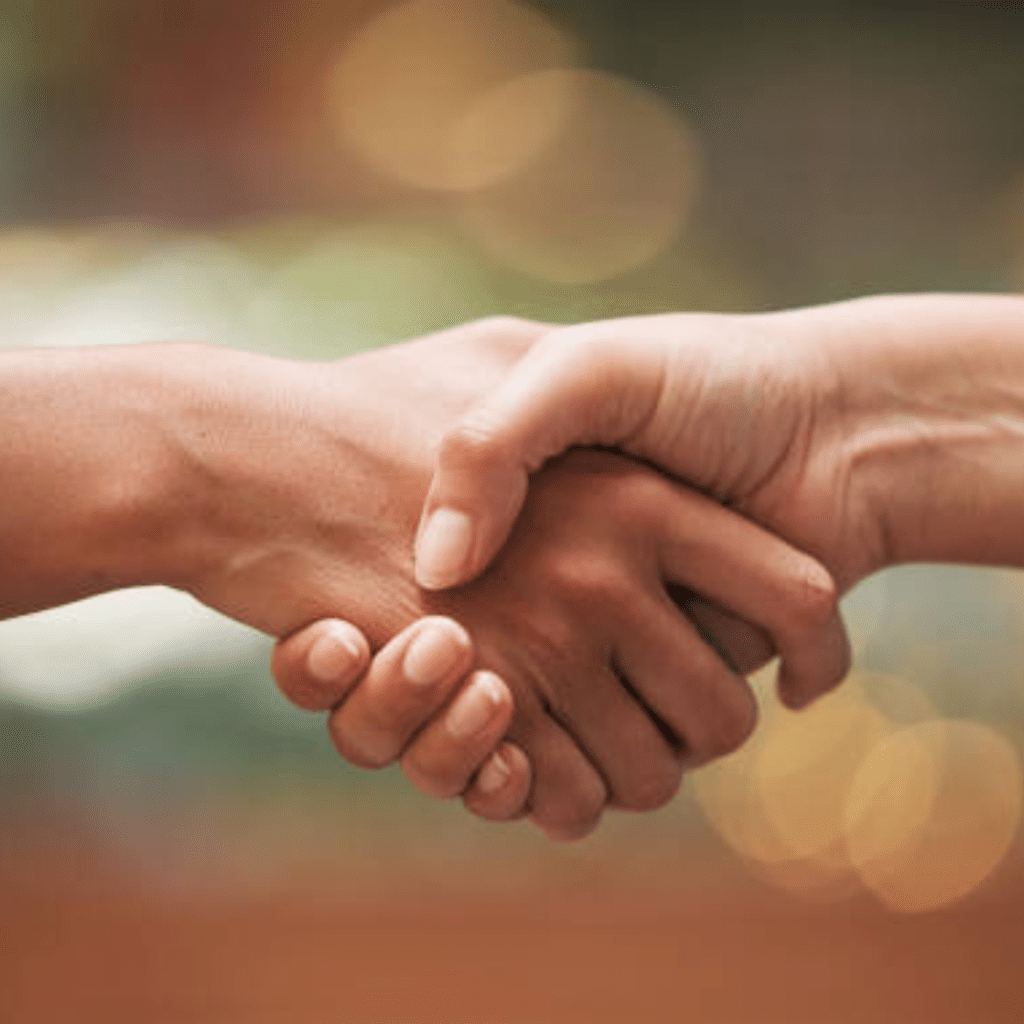 Image illustrates handshakes for bartering.
