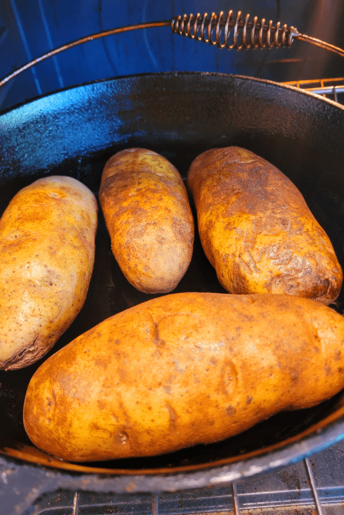 Image illustrates baking potatoes for twice baked potatoes casserole.