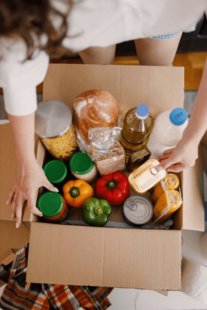 Image illustrates a box of food for bartering. 