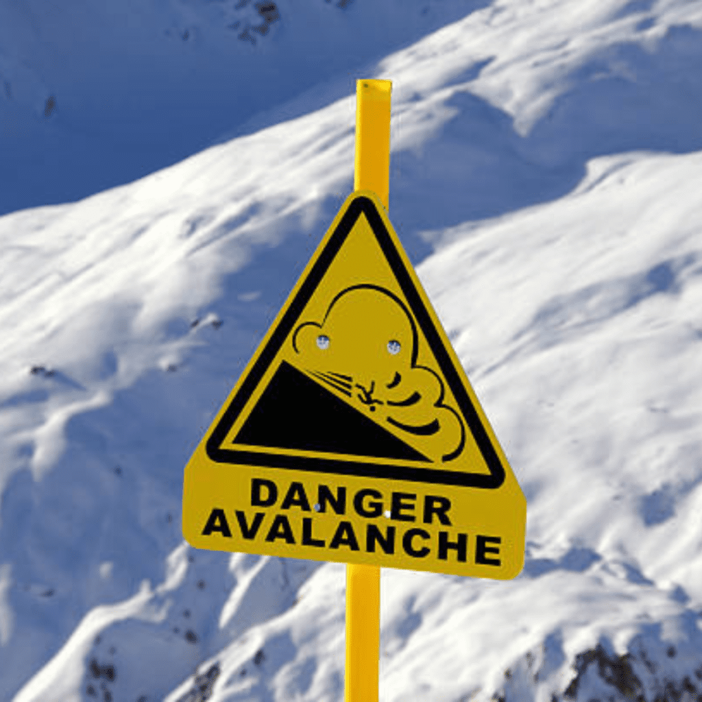 Image illustrates a danger sign for an avalanche demonstrating the importance of avalanche gear.